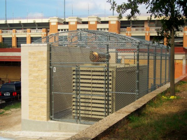 Chain Link Enclosure with Brick Wall
