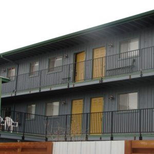 Wrought Iron Guard Rail & Wood Parking Fence