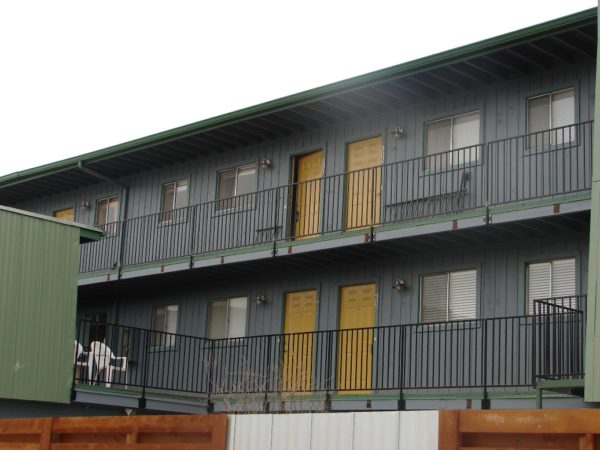 Wrought Iron Guard Rail & Wood Parking Fence