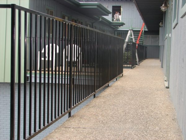 Wrought Iron Guard Rail & Wood Parking Fence - Image 2