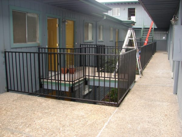 Wrought Iron Guard Rail & Wood Parking Fence - Image 3
