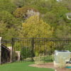 Three-Rail Iron Fence with Custom Swing Gate - Image 4