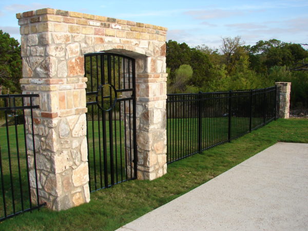 Three-Rail Iron Fence with Custom Swing Gate