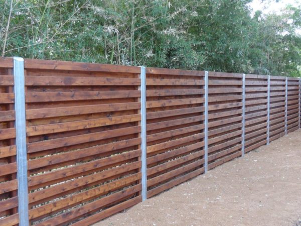 Custom Stained Wood Fence with Steel Accents - Image 4