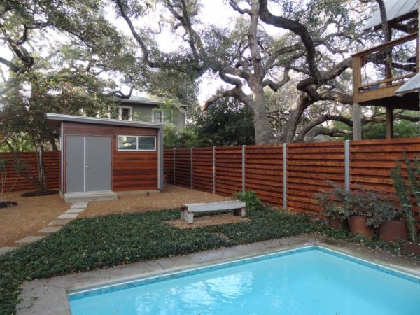 Custom Stained Wood Fence with Steel Accents