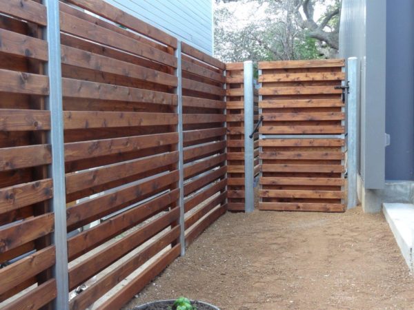 Custom Stained Wood Fence with Steel Accents - Image 2