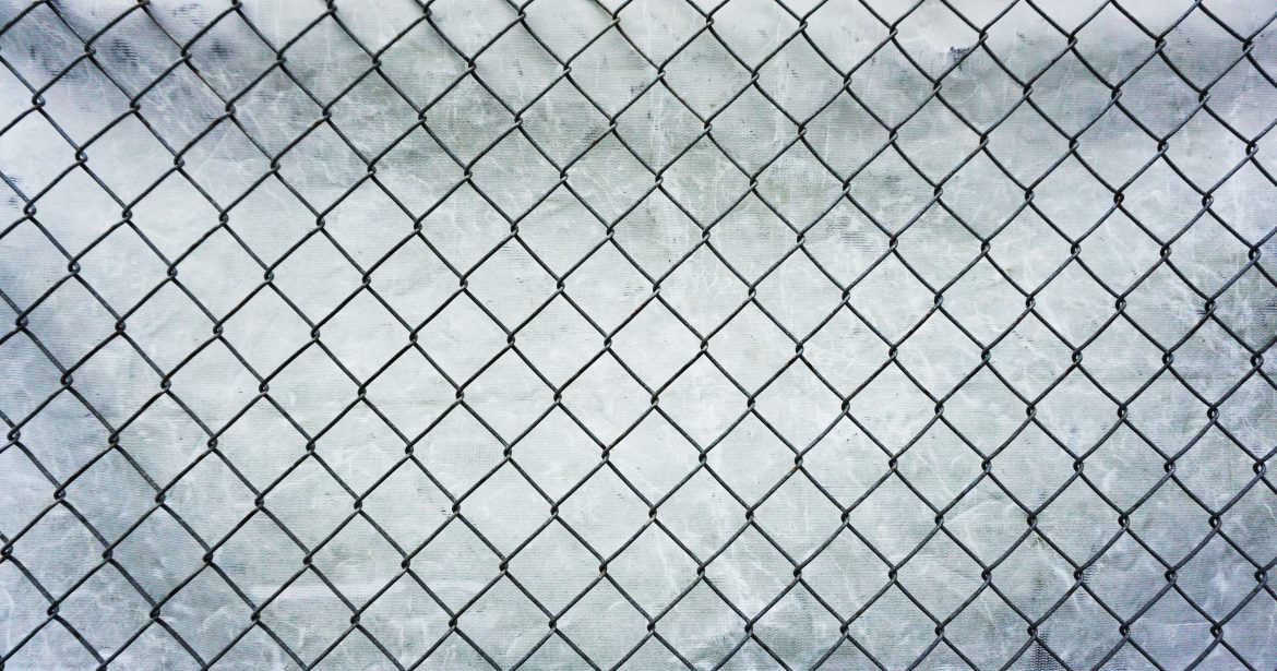 how to install chain link fence on uneven ground
