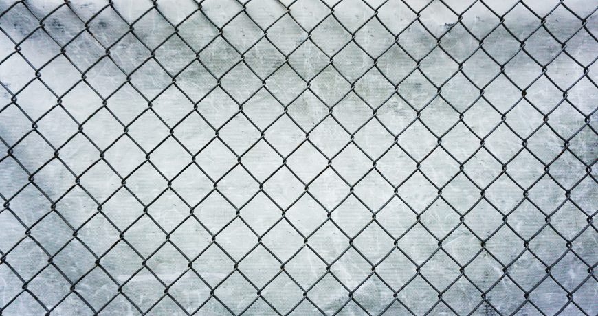 how to install chain link fence on uneven ground