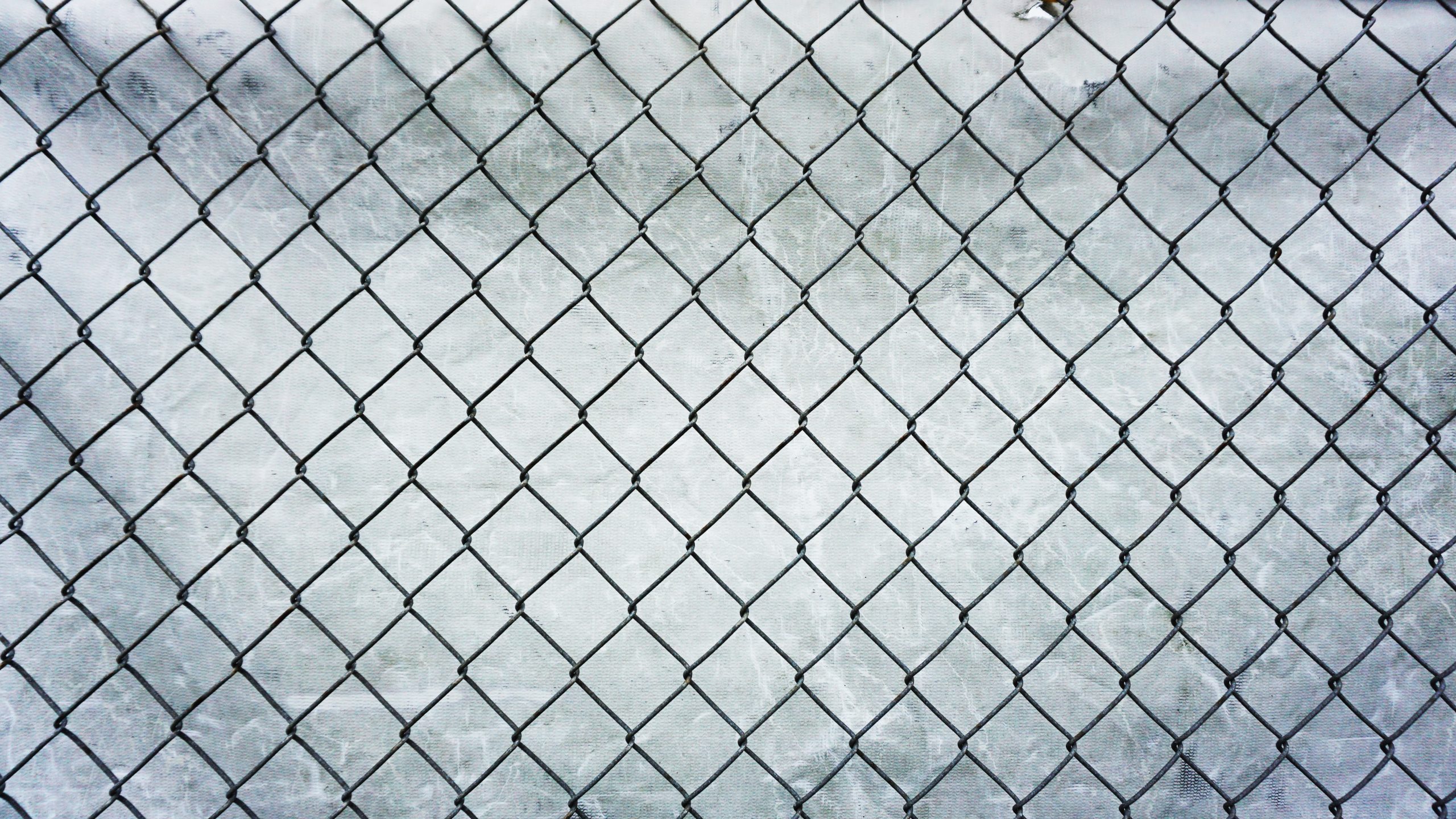 Chain link fence uneven ground outlet